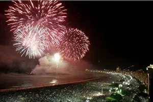 Prints of Fireworks explode above Copacabana beach in Rio de Janeiro at midnight, January 1, 2006 Brazil Prints: Fireworks explode above Copacabana beach in Rio de Janeiro at midnight