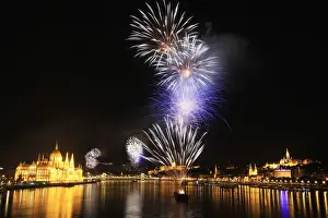 Fireworks explode over Danube River during Saint Stephens Day in Budapest
