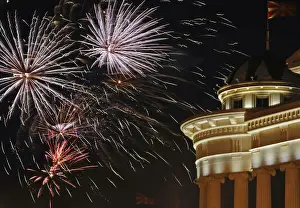 Fireworks explode near the Archeological museum in Skopjes central square during