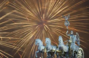 Fireworks explode during new year celebrations over the Brandenburger Tor gate in Berlin