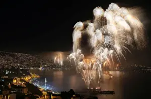 New Year Prints: Fireworks explode during a pyrotechnic show to celebrate the new year in the coastal city