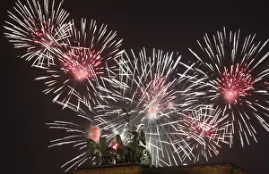 Celebration Prints: Fireworks explode next to the Quadriga sculpture atop the Brandenburg gate during