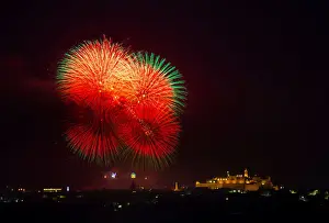 Malta Prints: Fireworks explode over the town of Victoria on the Maltese island of Gozo during