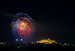 Celebration Prints: Fireworks explode over the town of Victoria on the Maltese island of Gozo during celebrations