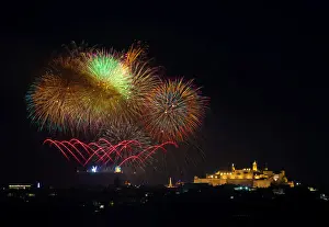 Fireworks explode over the town of Victoria on the Maltese island of Gozo during celebrations