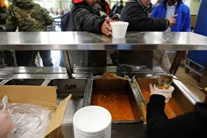 Fish soup is served for lunch to homeless men sheltering in the Pine Street Inn