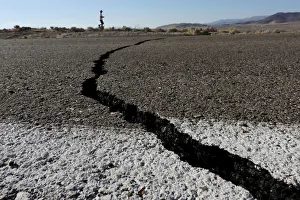 Fissures that opened up under a highway during a powerful earthquake that struck Southern Fissures that opened up under a highway during a powerful earthquake that struck Southern