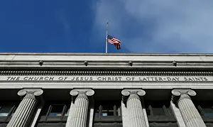 A flag flies at half mask outside the world headquarters of the Mormon Church for Thomas
