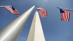 Images Dated 2014 May: Flags flutter during re-opening ceremony for Washington Monument in Washington