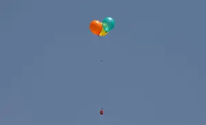 Prints of Flaming balloons are released by Palestinian demonstrators to the Israeli side during a protest demanding the right to return to their homeland, at the Israel-Gaza border, east of Gaza City May 11 Israel Prints: Flaming balloons are released by Palestinian demonstrators to the Israeli side during a