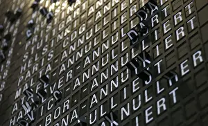 Flight schedule board is updated with cancelled flights during second day of strike