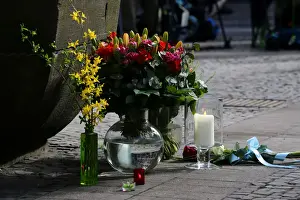 Prints of Flowers are seen on the site where on April 7 a man drove a van into a group of people sitting outside a popular restaurant in the old city centre of Muenster, Germany April 8, 2018 Germany Prints: Flowers are seen on the site where on April 7 a man drove a van into a group of people