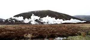 Train Prints: The Flying Scotsman steam train travels north through the Drumochter Pass, Scotland