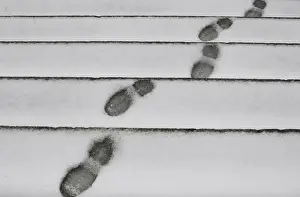 Weather Prints: Footprints can be seen on the snow outside Madrids Almudena Cathedral as freezing