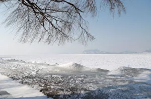 Weather Prints: Frozen Lake Balaton is seen during a winter day in Fonyod