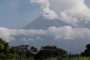 Guatemala Prints: The Fuego volcano spews out a plume of ash and smoke as seen from El Rodeo in Escuintla