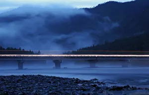 General night view of a bridge across river Us about 750 km south of Krasnoyarsk