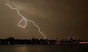 Weather Prints: General view as lightning strikes over the city of London, Britain