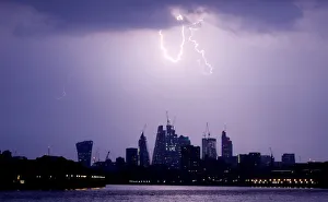 Weather Prints: General view as lightning strikes over the city of London