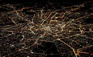 A general view of night Moscow is seen from the window of a passenger jet
