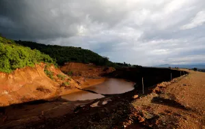Kenya Prints: A general view shows the dam that burst its walls, overrunning nearby homes
