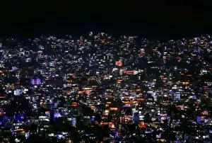 Diwali Prints: A general view shows houses decorated with lanterns and lights during the Tihar festival