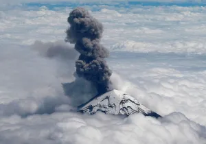 Mexico Prints: A general view shows the Popocatepetl volcano spews a cloud of ash high into the air as