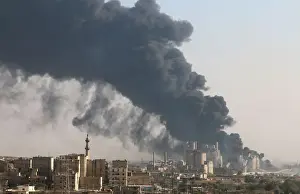 Mideast Prints: A general view shows rising smoke from a Syrian regime controlled cement factory