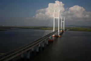 Northkorea Prints: A general view shows the unfinished New Yalu River bridge that was designed to connect