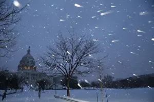 A general view of the U. S. Capitol in early morning snow in Washington