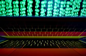 Prints of A German flag is seen on the laptop screen in front of a computer screen on which cyber code is displayed, in this illustration picture taken March 2, 2018. REUTERS/Kacper Pempel/Illustration Germany Prints: German flag is seen on the laptop screen in front of a computer screen on which cyber
