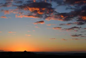 Glastonbury Tor is seen at dawn on the Summer Solstice in Glastonbury