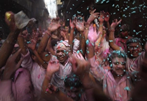 <b class=qtipBold><figcaption>GM1E631146L01</figcaption></b><br>Hindu devotees celebrate Holi, also known as the festival of colours, outside a temple on the outskirts of the northern Indian city of Mathura March 1, 2010. This tradition heralds the beginning of spring and is celebrated all over India. REUTERS/Reinhard Krause (RELIGION SOCIETY IMAGES OF THE DAY) GM1E631146L01