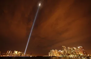 <b class=qtipBold><figcaption>GM1E69C0TEM01</figcaption></b><br>The "Tribute in Lights" illuminates the sky over lower Manhattan (L) and Jersey City, New Jersey (R) on the ninth anniversary of the attack on the World Trade Center as seen across the Hudson River from Hoboken, New Jersey, September 11, 2010. REUTERS/Gary Hershorn (UNITED STATES - Tags: DISASTER ANNIVERSARY IMAGES OF THE DAY) GM1E69C0TEM01