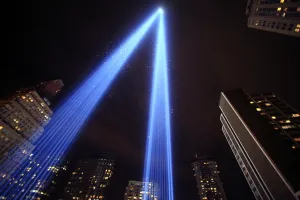 <b class=qtipBold><figcaption>GM1E69C0WOT01</figcaption></b><br>The "Tribute in Lights" illuminates the sky over lower Manhattan on the ninth anniversary of the attack on the World Trade Center in New York, September 11, 2010. REUTERS/Eric Thayer (UNITED STATES - Tags: DISASTER ANNIVERSARY) GM1E69C0WOT01