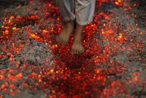 <b class=qtipBold><figcaption>GM1E6CG133001</figcaption></b><br>A Shi'ite Muslim walks on fire at a ceremony during the Ashura festival at a mosque in central Yangon December 16, 2010. Ashura, the most important day in the Shi'ite calendar, which commemorates the death of Imam Hussein, grandson of the Prophet Mohammad, in the 7th century battle of Kerbala. REUTERS/Soe Zeya Tun (MYANMAR - Tags: SOCIETY RELIGION IMAGES OF THE DAY) GM1E6CG133001