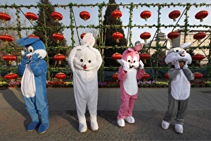 Prints of Performers dressed in rabbit costumes stand at a temple fair to celebrate the Lunar New Year in Beijing February 2, 2011 China Prints: GM1E722134Z01