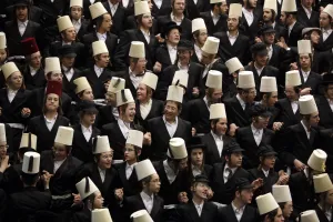 Prints of Ultra-Orthodox Jewish men dance while celebrating the Jewish holiday of Purim at a synagogue in Bnei Brak early morning March 20, 2011 Israel Prints: GM1E73K0U9S01