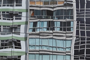 <b class=qtipBold><figcaption>GM1E73P11L801</figcaption></b><br>Buildings are reflected on the glass facade of a building in Botafogo in Rio de Janeiro February 25, 2011. Rio, boasting picture-postcard scenery and plans for big investments ahead of the World Cup in 2014 and the Olympic Games two years later, is not alone in a Brazilian housing boom that is inevitably raising fears of an asset bubble in one of the world's hottest emerging markets. Picture taken February 25, 2011. To match Feature BRAZIL-HOUSING/ REUTERS/Ricardo Moraes (BRAZIL - Tags: BUSINESS CITYSCAPE) GM1E73P11L801