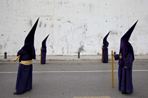<b class=qtipBold><figcaption>GM1E74K0BG501</figcaption></b><br>Penitents take part in a procession of the "Via Crucis" brotherhood during Holy Week in Granada, southern Spain, April 19, 2011. Hundreds of processions take place around the clock in Spain during Holy Week, drawing thousands of visitors. REUTERS/Pepe Marin (SPAIN - Tags: RELIGION SOCIETY IMAGES OF THE DAY) GM1E74K0BG501
