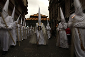 <b class=qtipBold><figcaption>GM1E74K0JDW01</figcaption></b><br>Penitents take part in the procession of "Rocio" brotherhood during Holy Week in the Andalusian city of Malaga, southern Spain, April 19, 2011. Hundreds of processions take place around the clock in Spain during Holy Week, drawing thousands of visitors. REUTERS/Jon Nazca (SPAIN - Tags: RELIGION SOCIETY ANNIVERSARY) GM1E74K0JDW01