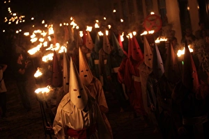 Prints of Penitents participate in the Procession of the Torches during Holy Week in Goias Velho, west of Brasilia, April 21, 2011 Brazil Prints: GM1E74L1JDK01