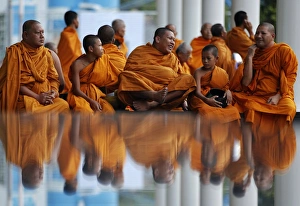 <b class=qtipBold><figcaption>GM1E758108C01</figcaption></b><br>Buddhist monks attend an alms offering ceremony at Bangkok's shopping district May 8, 2011. Buddhist monks, numbering 12,600, according to organisers, attended the ceremony on Vesak Day, the annual celebration of Buddha's birth, enlightenment and death. The event was organised to pay homage to the Lord Buddha and to give moral support to the Buddhist monks and novices from the troubled southern provinces of Thailand. This year marks 2600th anniversary of the Buddha's enlightenment. REUTERS/Damir Sagolj (THAILAND - Tags: IMAGES OF THE DAY SOCIETY RELIGION) GM1E758108C01