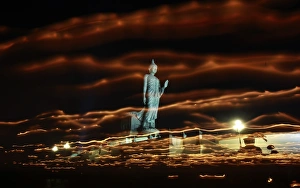 <b class=qtipBold><figcaption>GM1E75H1P7U01</figcaption></b><br>Buddhists carry candles while encircling a large Buddha statue during Vesak Day, an annual celebration of Buddha's birth, enlightenment and death, at a temple in Nakhon Pathom province on the outskirts of Bangkok May 17, 2011. This year marks 2600th anniversary of Buddha's enlightenment. Picture taken using long exposure. REUTERS/Chaiwat Subprasom (THAILAND - Tags: ANNIVERSARY SOCIETY RELIGION IMAGES OF THE DAY) GM1E75H1P7U01
