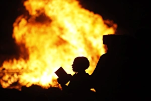 <b class=qtipBold><figcaption>GM1E75M0KCY01</figcaption></b><br>An Ultra Orthodox Jewish boy prays next to a bonfire during Lag Ba-Omer festivities in Jerusalem's Mea Shearim neighbourhood May 21, 2011. Israelis celebrate the Jewish holiday of Lag Ba-Omer, which marks the end of a plague in the Middle Ages that killed thousands of disciples of a revered rabbi in the holy land, by lighting bonfires across the country. REUTERS/Nir Elias (JERUSALEM - Tags: RELIGION IMAGES OF THE DAY) GM1E75M0KCY01