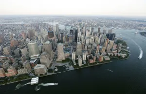 <b class=qtipBold><figcaption>GM1E78P18ET01</figcaption></b><br>The under-construction One World Trade Center stands over the World Trade Center construction site and the National September 11 Memorial and Museum in New York's Lower Manhattan August 24, 2011. New York will mark the 10th anniversary of the attack on the World Trade Center with ceremonies on September 11, 2011. REUTERS/Lucas Jackson (UNITED STATES - Tags: ANNIVERSARY CITYSCAPE BUSINESS CONSTRUCTION DISASTER) GM1E78P18ET01