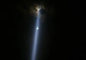 <b class=qtipBold><figcaption>GM1E79B0O0J01</figcaption></b><br>A plane flies through the "Tribute in Lights" in lower Manhattan in New York September 10, 2011. New York will mark the 10th anniversary of the 9/11 attacks on the World Trade Center with ceremonies on Sunday. REUTERS/Eric Thayer (UNITED STATES - Tags: ANNIVERSARY DISASTER TPX IMAGES OF THE DAY) FOR BEST QUALITY IMAGE: ALSO SEE GM1E79C1CUN01. GM1E79B0O0J01