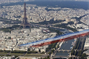 <b class=qtipBold><figcaption>GM1E97E1M3001</figcaption></b><br>The French aerial display team Patrouille de France (French Aerobatic Patrol) flies in front of the Eiffel tower as part of the traditional Bastille day military parade, in Paris, July 14, 2013. REUTERS/Charles Platiau (FRANCE - Tags: ANNIVERSARY MILITARY TPX IMAGES OF THE DAY) - RTX11MJ5 GM1E97E1M3001