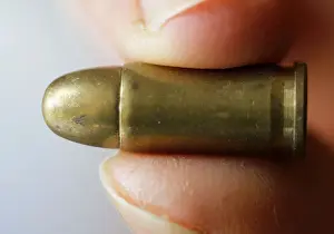 Images Dated 19th March 2018: A guns collector holds a 7. 65 caliber bullet in his house in Bordeaux