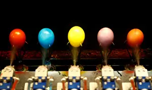 Hard-boiled eggs are coloured on the production line at the Schloegl egg company in